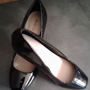 Black Patten leather platform.